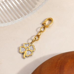 Polished 18K gold plated clover pendant with zircon inlay and silver textured petal edges