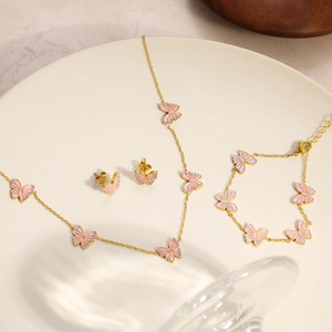 Exquisites 18K vergoldetes Schmetterlings-Schmuckset mit Emaille auf Keramiktablett