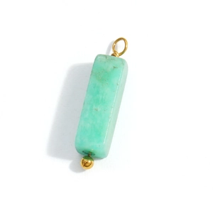 Natural light green stone cylinder pendant with golden metal loop on white background