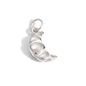 Detailed view of silver polished croissant pendant charm for DIY jewelry necklace