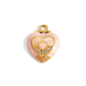 Detail showing a pink enamel heart pendant with gold plating and zircon stone accents