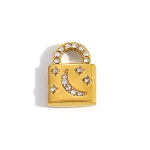 Detailed view of a gold-plated lock pendant with crescent moon and star zircon inlay