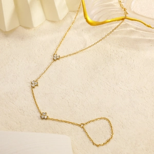 18K gold plated clover hand chain with sparkling zircon stones and finger ring design