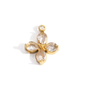 Macro detail of four-leaf clover zircon pendant with gold plated DIY jewelry setting