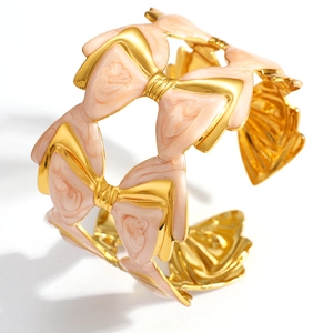 Bracelet manchette nœud plaqué or 18K avec émail effet marbre pour femmes élégantes