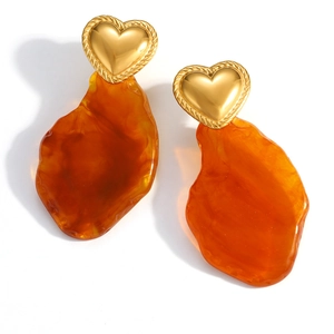 Elegant 18K gold-plated heart earrings with irregular amber resin pendants on white back