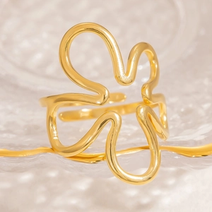 Elegant gold flower shaped open stainless steel ring with a polished minimalist finish