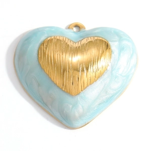 Golden heart pendant with light blue enamel inlay and brushed metal texture finish