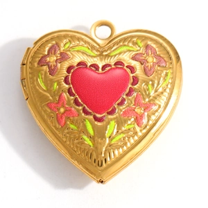 Gold-plated heart locket with red heart and floral relief, opening for photos
