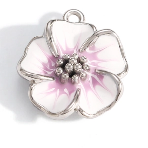 Detailed macro view of a 3D gradient purple and white enamel flower pendant charm