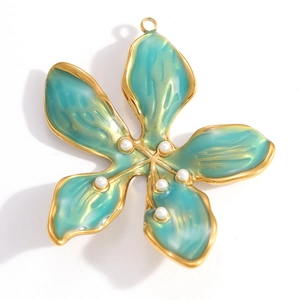 Detailed close-up of a golden flower pendant with blue enamel and small white pearls