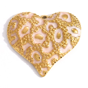 Detail view of heart-shaped gold-tone pendant with pink leopard-pattern enamel inlay
