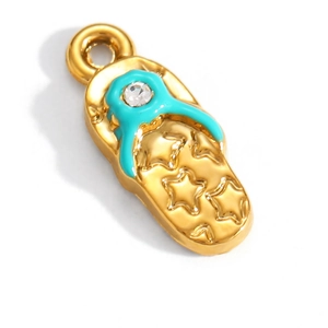 Close-up of 18K gold-plated flip flop pendant with blue enamel and star engraving