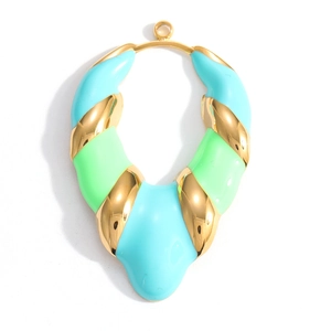 Macro detail of wave pendant with blue and green enamel and polished gold plating