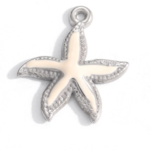 Macro detail of silver starfish pendant with cream enamel and 18K gold plating