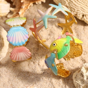 Bracelets océan réglables en acier doré avec étoile de mer et coquillage en émail