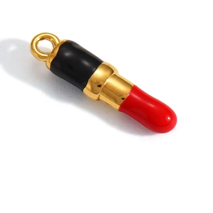 Detailed view of lipstick-shaped pendant with red and black enamel in gold finish