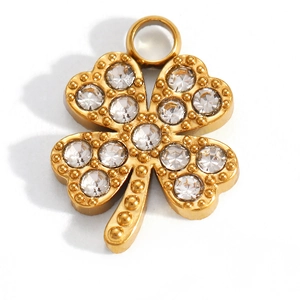 Close-up of gold-plated four-leaf clover pendant featuring crystal rhinestones and beaded border