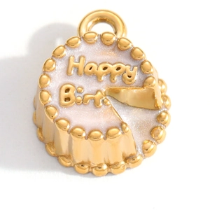 Macro detail of a gold birthday cake pendant with pink enamel and Happy Birth text