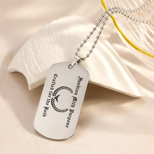 Classic silver dog tag necklace with laurel wreath engraving and bead chain