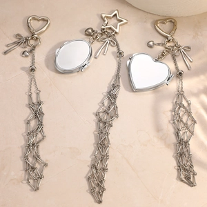 Minimalist stainless steel heart mirror bag charms with bow details and mesh chains