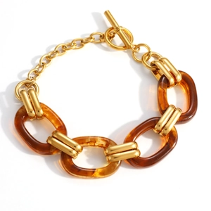 18K gold plated stainless steel bracelet with amber resin oval links and toggle clasp