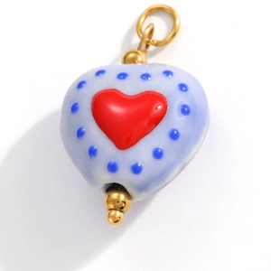 DIY heart-shaped pendant in lilac enamel with red heart and blue polka dots