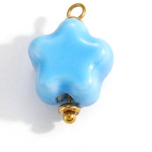 Detail of light blue star pendant with gold metal ring for DIY jewelry making