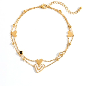 Tobillera de doble capa en acero inoxidable chapado en oro de 18K con dijes de corazón