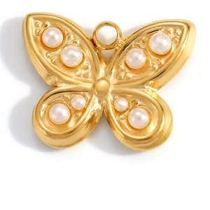 Close-up of 18K gold-plated butterfly pendant with inlaid pearls and top attachment ring