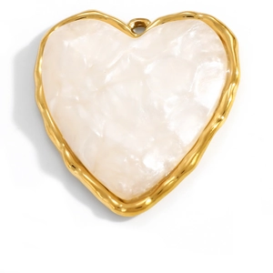 Detail of heart pendant with gold metal edges and pearl white resin texture
