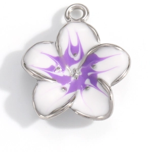 Macro shot of silver five-petal flower pendant with white and purple drip oil details