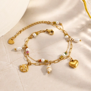 Bracelet double rang en acier inoxydable avec breloques coquillage et cœur