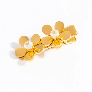 18k gold plated stainless steel floral hair clip with crystal centers on white background