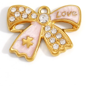 Detail of gold-plated bow pendant with pink enamel, Love engraving and sparkling crystals