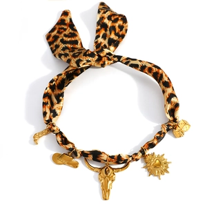 Western style leopard print silk choker necklace with gold cowboy charms and natural stones