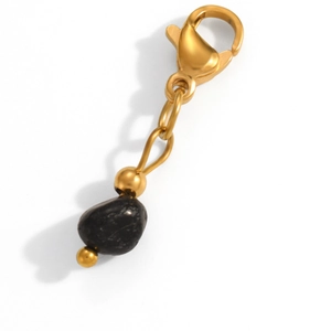 Detailed view of a gold lobster clasp pendant featuring a polished black natural stone bead