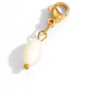 Detail of a gold lobster clasp paired with a white oval faux pearl jewelry pendant