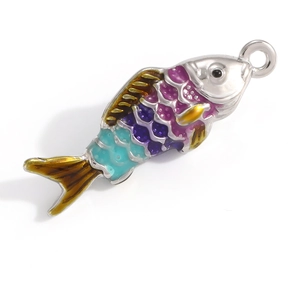 Detailed macro view of silver fish pendant with purple and blue enamel gradient scales