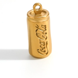 Detailed macro view of a golden stainless steel pendant shaped like a classic cola can