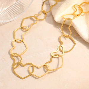 Polished 18K gold plated stainless steel bracelet with interlocking hollow heart links