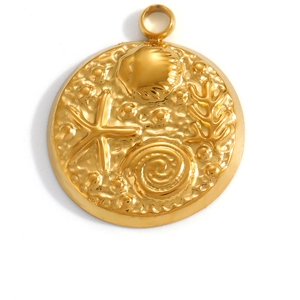 Detail showing a golden round pendant with embossed starfish, seashell and coral ocean motifs