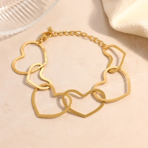 Detail of 18K gold plated stainless steel bracelet with interlocking heart-shaped links