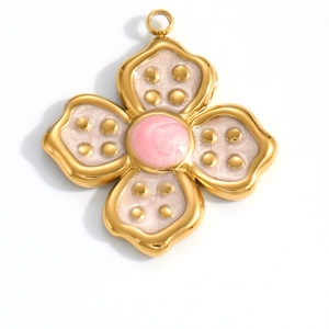 Golden flower pendant with white enamel petals and pink spiral center for DIY necklaces