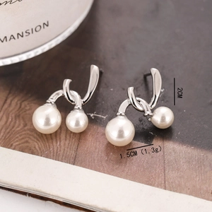 Elegant silver pearl earrings with minimalist double C cross design for women