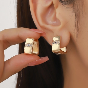 Elegant gold square hoop earrings featuring zircon evil eye charms for modern women