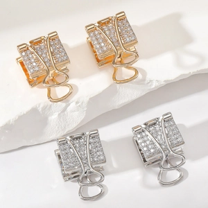 Boucles d'oreilles créatives avec strass en forme de pinces en or et argent