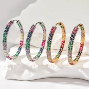 Chic hoop earrings featuring colorful cubic zirconia pave on gold and silver metal bases