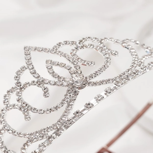 Elegant silver tiara with rhinestones and heart patterns for bridal and girls hair decor