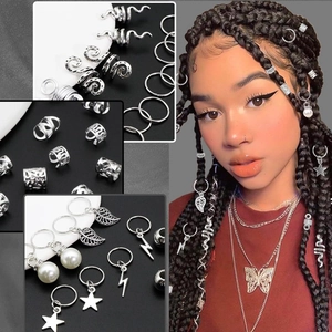Detailed set of silver hair jewelry featuring leaves, stars, and snakes for dreadlocks